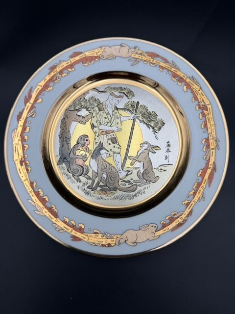 The Rabbit The Moon Collectible Hamilton Chokin Collection Plate: Hamilton Chokin Collection Plate "The Rabbit in the Moon". This is plate number 0399J from the Fairy Tales of Old Japan series, featuring intricate metal engravings enhanced with 24K gold accents.