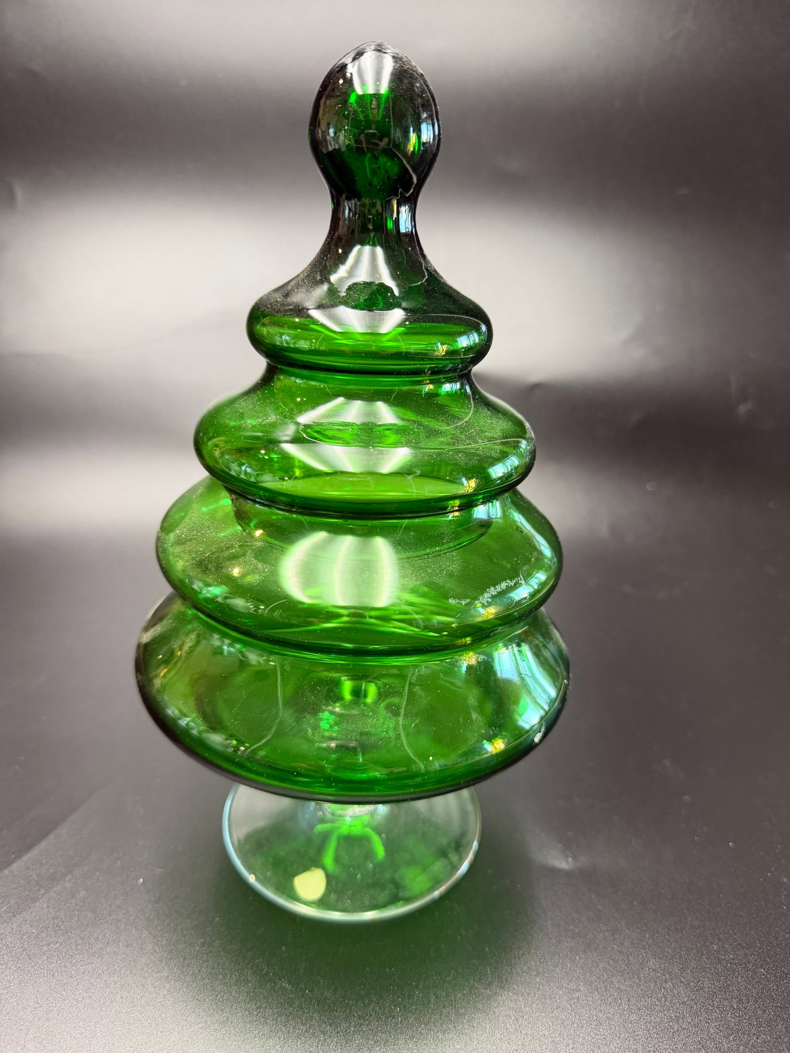 Vintage Green Glass Christmas Tree Candy Dish: It features a stacked, tiered design resembling a Christmas tree with a matching lid. Mid century modern Italian glass production, particularly from the Empoli region aka Empoli Circus Tent Optic