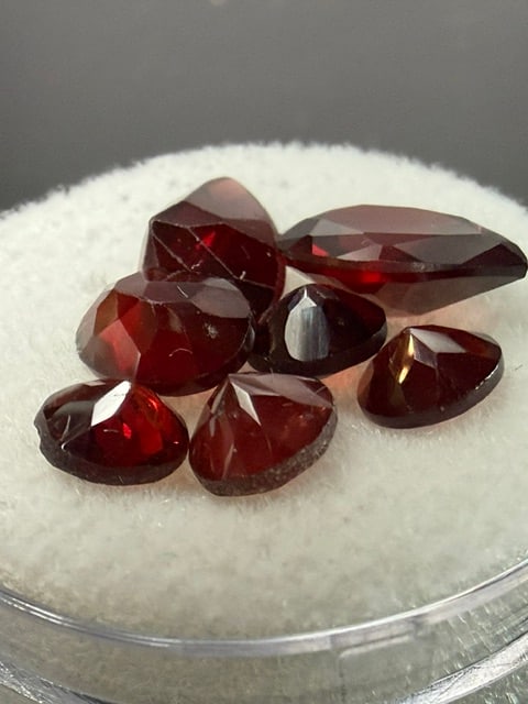 7.8 CTS Natural Red Garnet Gemstones: The stones appear to be natural red garnets, frequently listed as Mozambique garnet or similar varieties known for their deep red color. These loose gemstones are typically purchased for handmade jewe