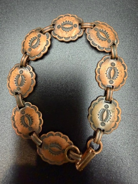 Vintage Southwestern Style Copper Concho Link Bracelet: Copper bracelet often categorized as "Fred Harvey Era" jewelry, typically dating from the 1940s to the 1960s.