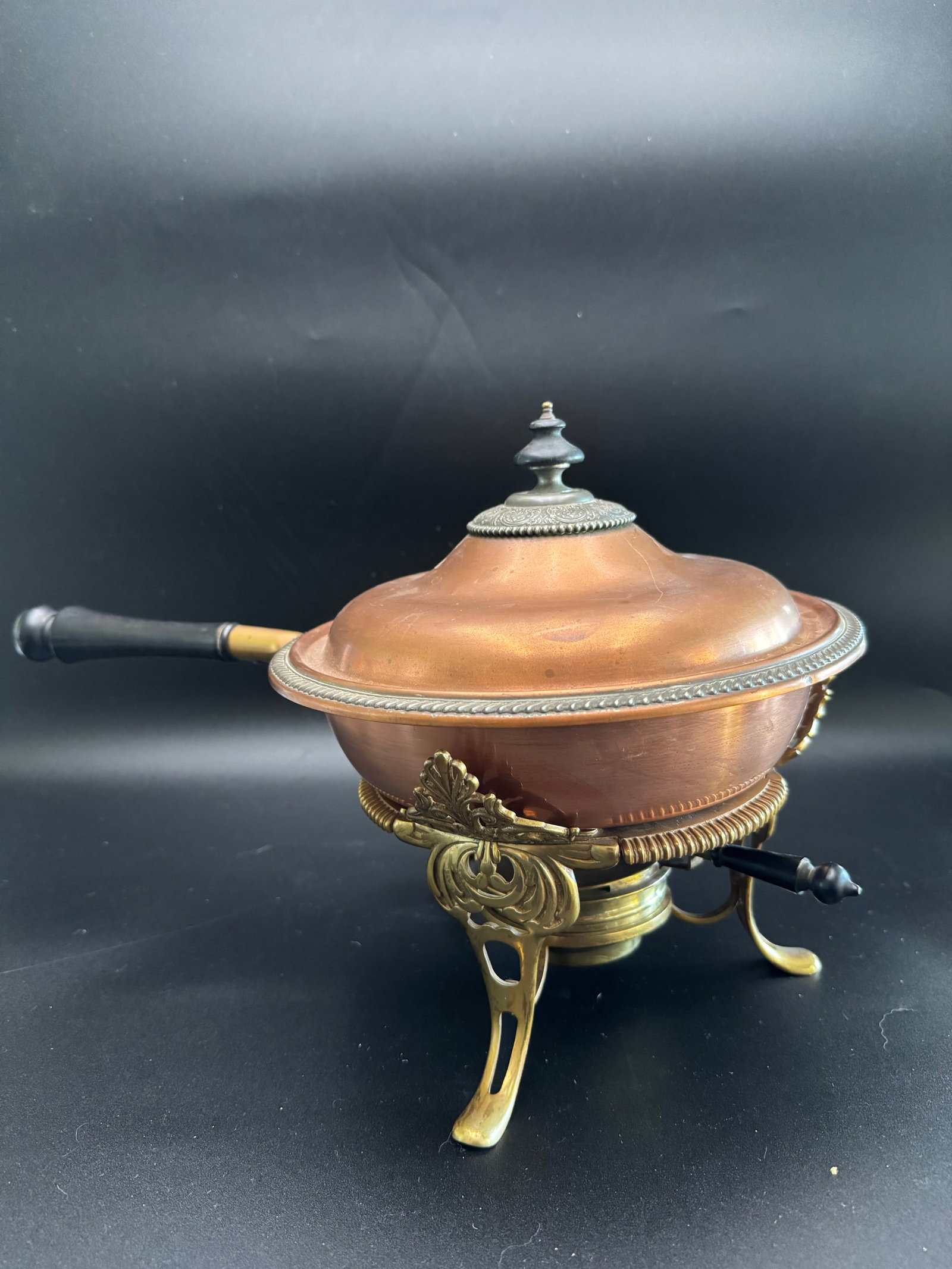 Brass Chaffing /Fondue Pot Stand With Cooper Pan and Lid: Vintage Brass Chaffing /Fondue stand with adjustable temperature control for a burner using alcohol or Sterno fuel. These dishes were widely used in the late 19th and early 20th centuries to keep