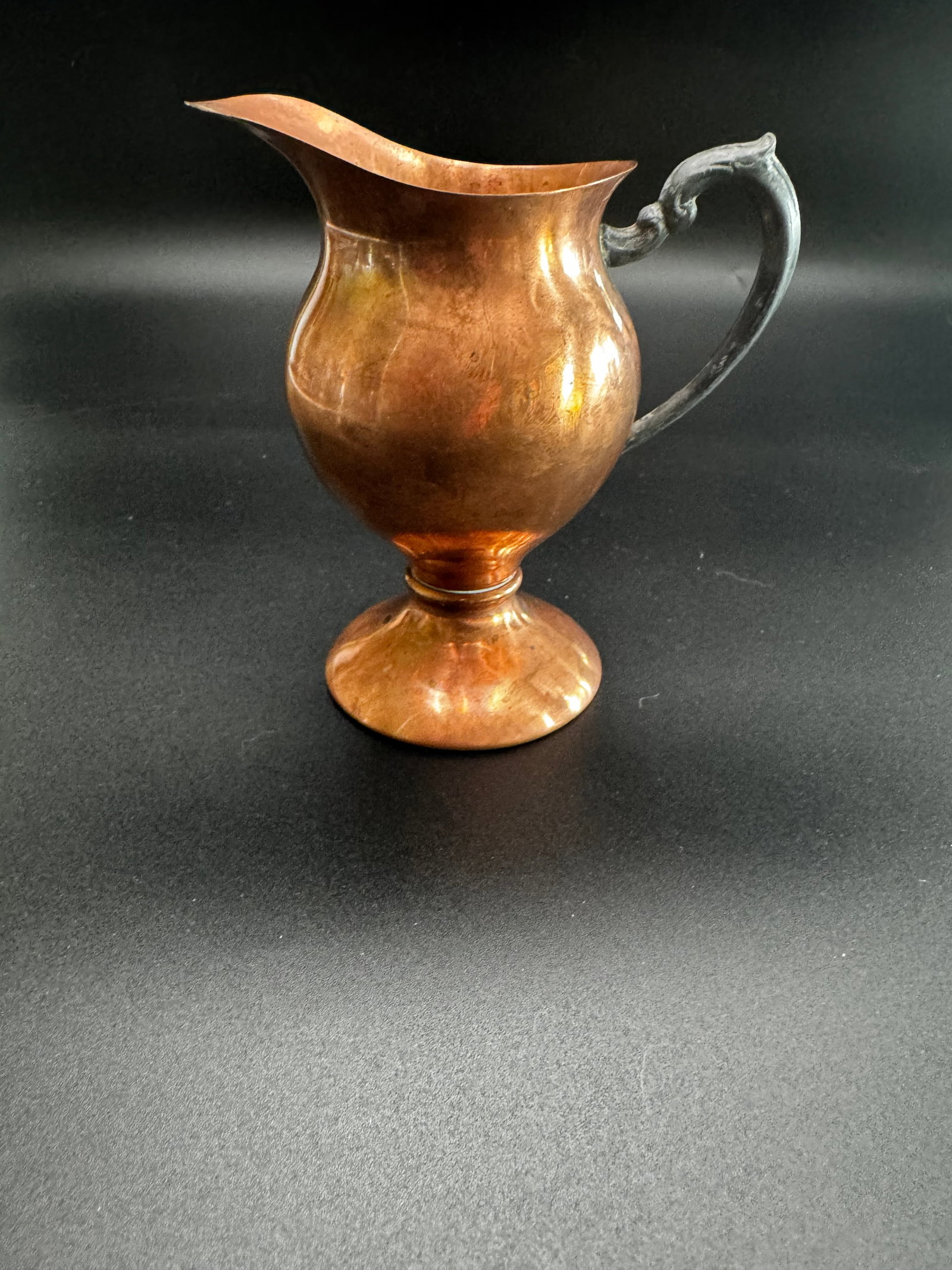 Art Deco Water Pitcher: 1930s Art Deco water pitcher manufactured by the Manning, Bowman & Co. company out of Meriden, Connecticut. Chromium plate on copper. Elegant baluster-shaped body with flared pouring spout and cast