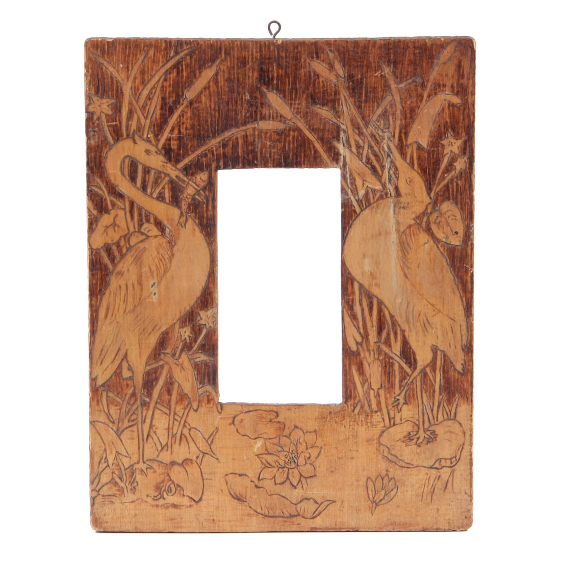 1910 W.E. Lunsford Arts and Crafts Pyrographic Pictoral Frame: A vintage Arts and Crafts pyrograph art frame depicting a scene with cranes. Piece has a textured edge with metal eyelet for hanging. 9.5 w, 12.5 h, 0.75 d inches.