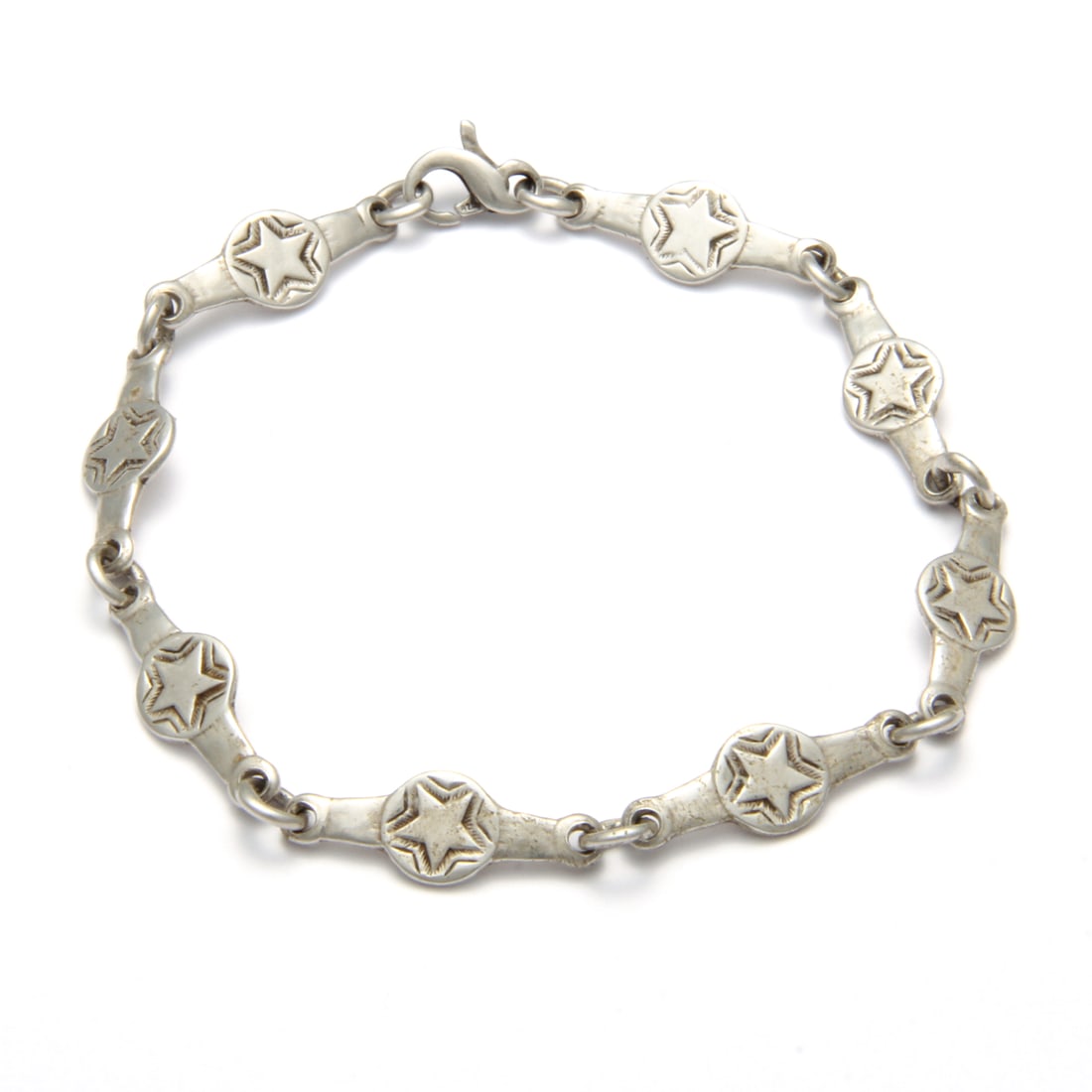 Designer Sterling Silver 925 Star Pattern Bracelet: A vintage sterling silver bracelet with designers "JEC STER 925" stamped mark. bracelet length is 9". Gross weight 12 grams.