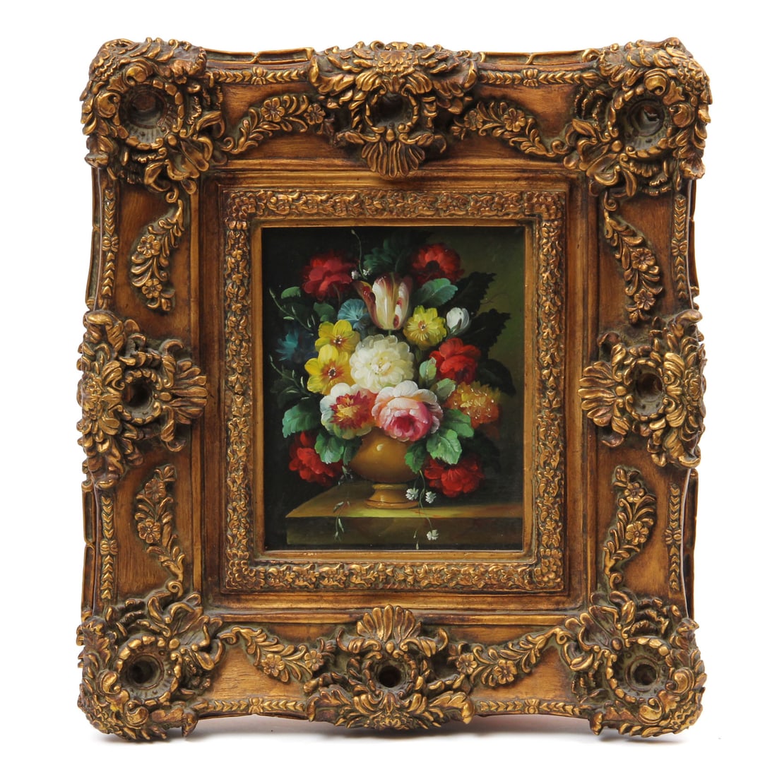 Floral Still Life Oil Painting: A vintage floral still life oil painting in ornate composite frame. 18w, 20h, 4d inches.
