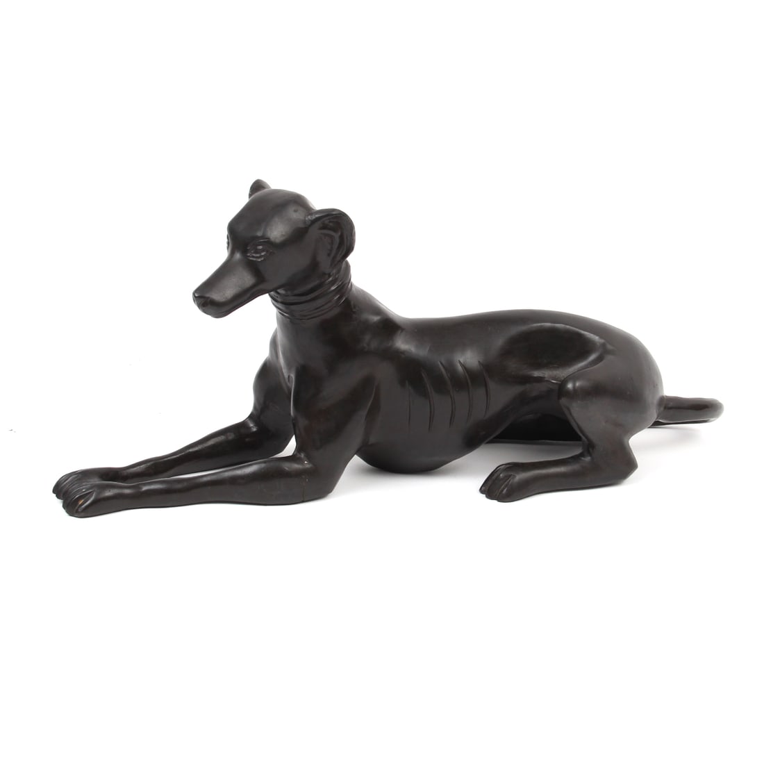 Reticulated Metal Seated Whippet Sculpture: A vintage reticulated metal sculpture of a seated Whippet dog, piece is made of hollow metal. 16w, 7h, 6d, inches.