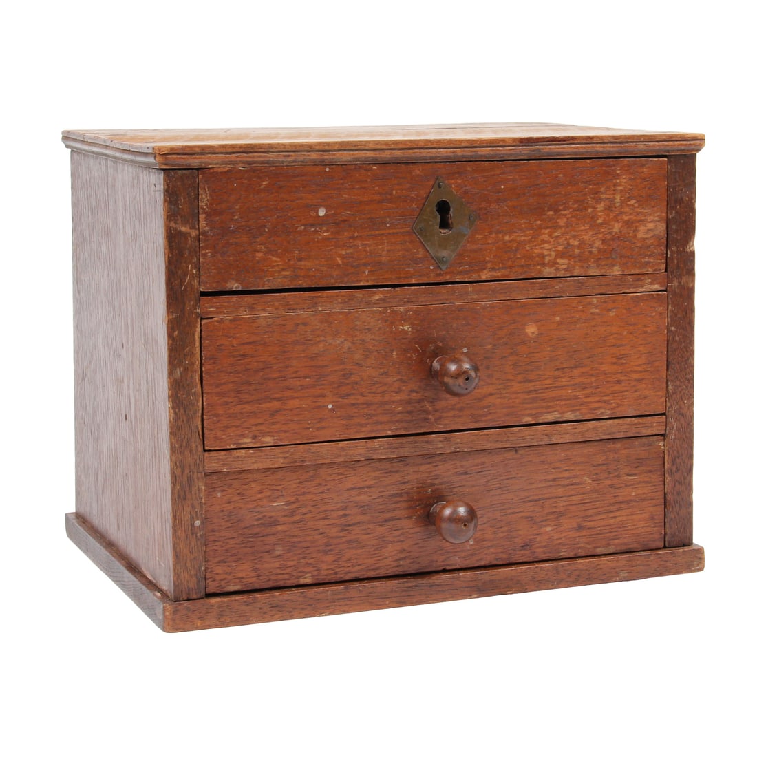 Antique Primitive Wood Drawered Box: An antique primitive wood drawed box with lock and dove-tailed drawers. 10w, 8h, 7.5d inches.