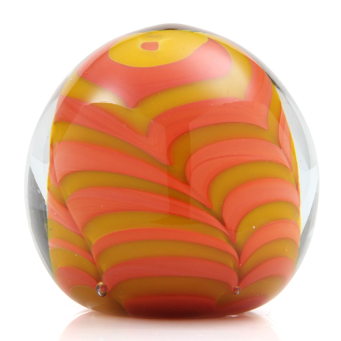 3.5" Hand Blown Art Glass Paperweight: A vintage hand blown art glass paperweight with yellow and orange/pink swirling feathered design. 3.5w, 3.5h inches.