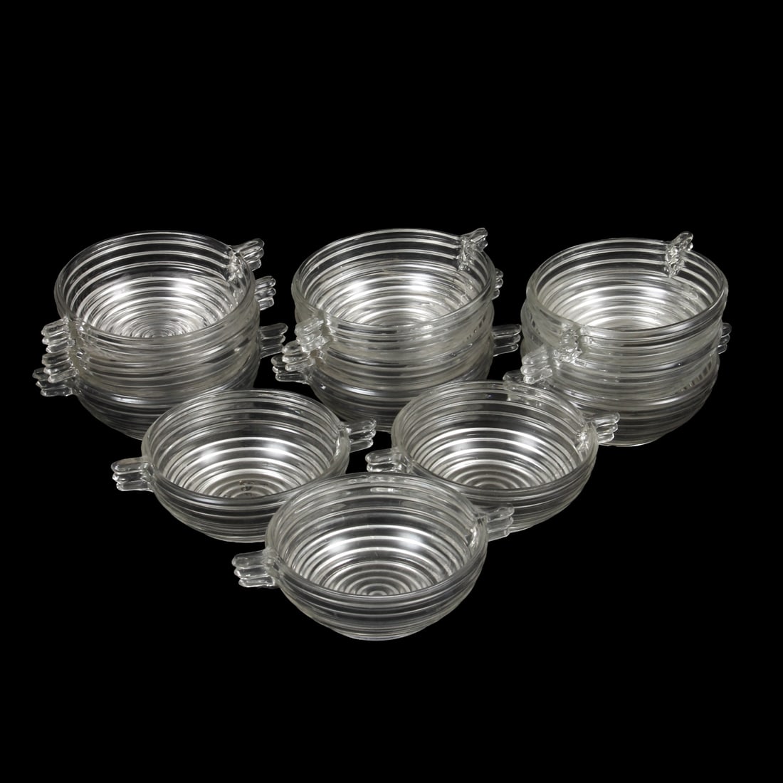 Anchor Hocking "Manhattan" Bowls, 12: A set of 12 small bowls by Anchor Hocking in the "Manhattan" pattern. 6w, 2h, 4.75d inches (of one bowl).
