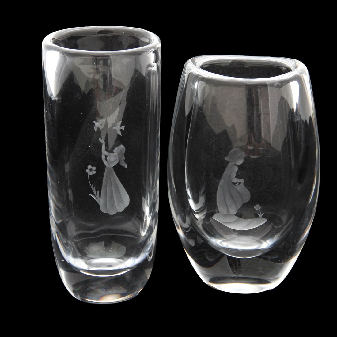 Pair of Orrefors Vases: A vintage pair of crystal vases by Orrefors. 3w, 7.5h, 2.25d inches (of tallest vase).