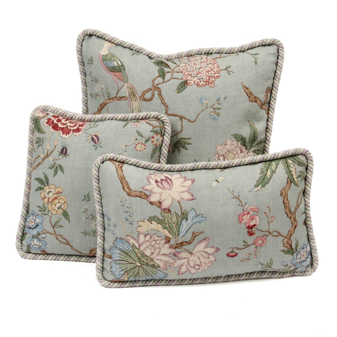 Floral Down Filled Pillows: A grouping of three floral motif down filled pillows with twist rope welting. 15w, 6h inches (of largest pillow).