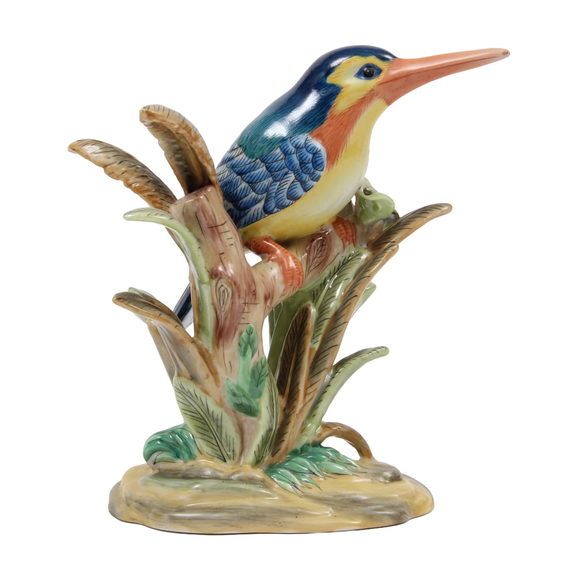 Hand-Painted Porcelain Kingfisher Bird Figurine: A hand-painted porcelain figurine of a Kingfisher bird resting in a branch. 6w, 7.5h, 3.5 inches.