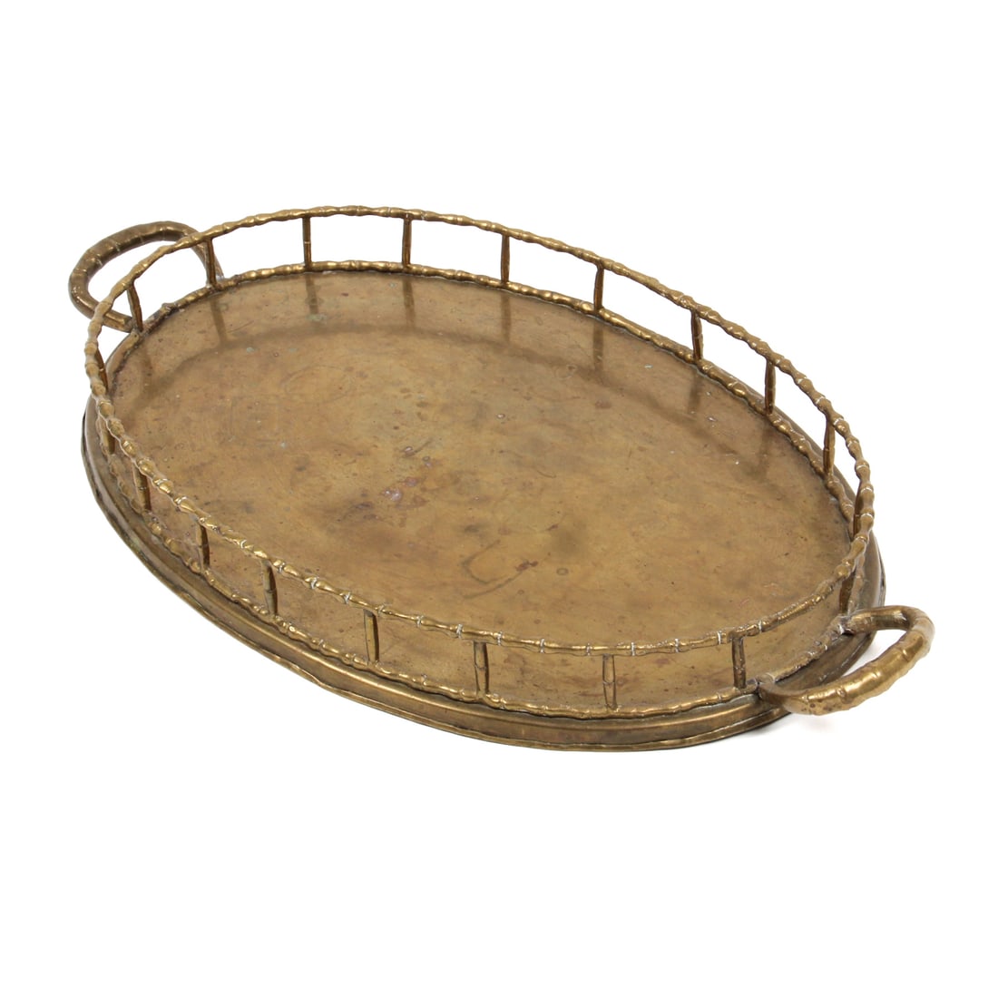 Brass Serving Tray with Bamboo Details: A vintage serving tray made of brass with bamboo style details. 20w, 2h, 12d inches.