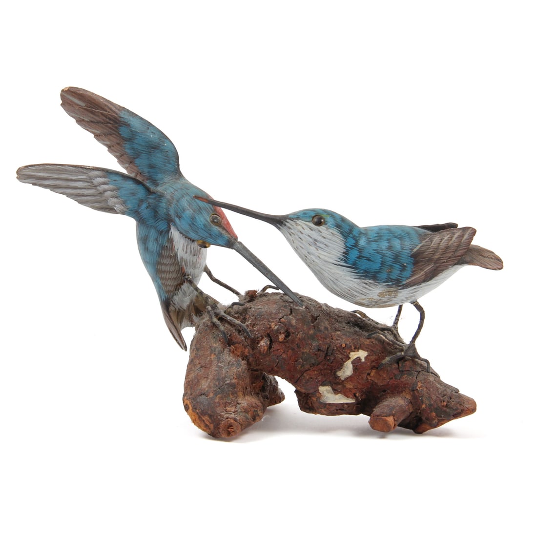Hand Carved and Painted Wood Hummingbirds: A hand carved and painted wood scukpture depicting hummingbirds on a wood branch. 6w, 4h, inches.