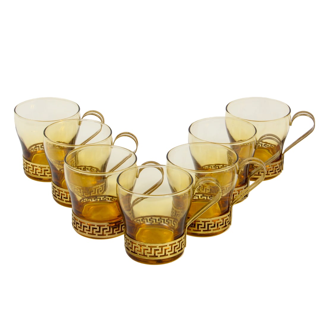Libbey Amber Glass Greek Key Glasses, Set of 7: A set of 7 vintage glasses by Libbey, these glasses have an amber colored glass portion with a greek key designed metal handle holder. piece is marked to bottom. 4.5w, 3h, 3d inches (of one cup).