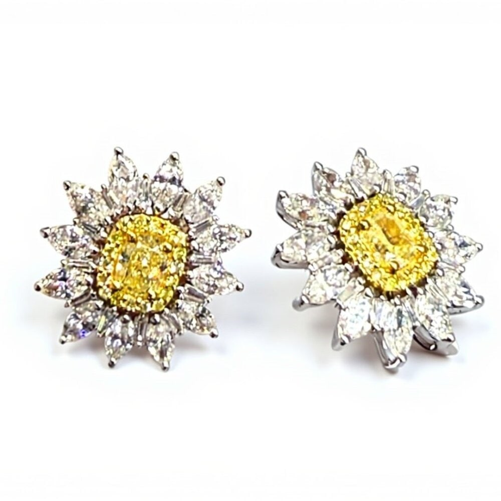 Sunflower Yellow & White 14K (or 18k upon request) White Gold Stud Earrings: Brighten up your style with these breathtaking sunflower-inspired earrings, showcasing a brilliant yellow diamond center surrounded by meticulously arranged white diamonds. Set in 14K white gold, thes