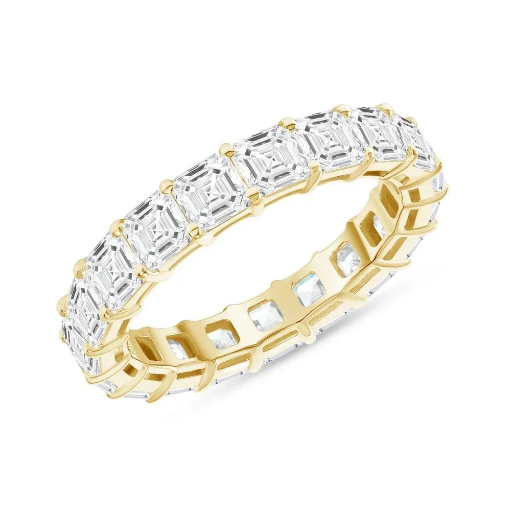 Asscher Cut 14K (or 18k upon request) Gold Eternity Band Ring: Featuring exquisite Asscher-cut diamonds, this ring offers a captivating brilliance that’s perfect for any special occasion. Available in a choice of 14kas well as platinum, this piece exudes luxury