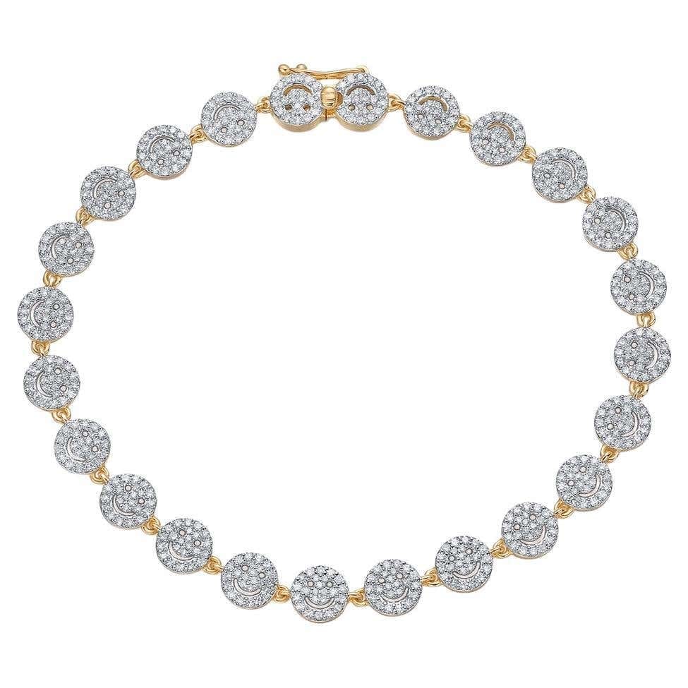 Round Cluster Diamond 14K (or 18K upon request) Yellow Gold Bracelet: A dazzling display of brilliance and sophistication, this Round Cluster Diamond Bracelet radiates timeless beauty. Expertly crafted in 14K yellow gold (available in 18K upon request), each circular li