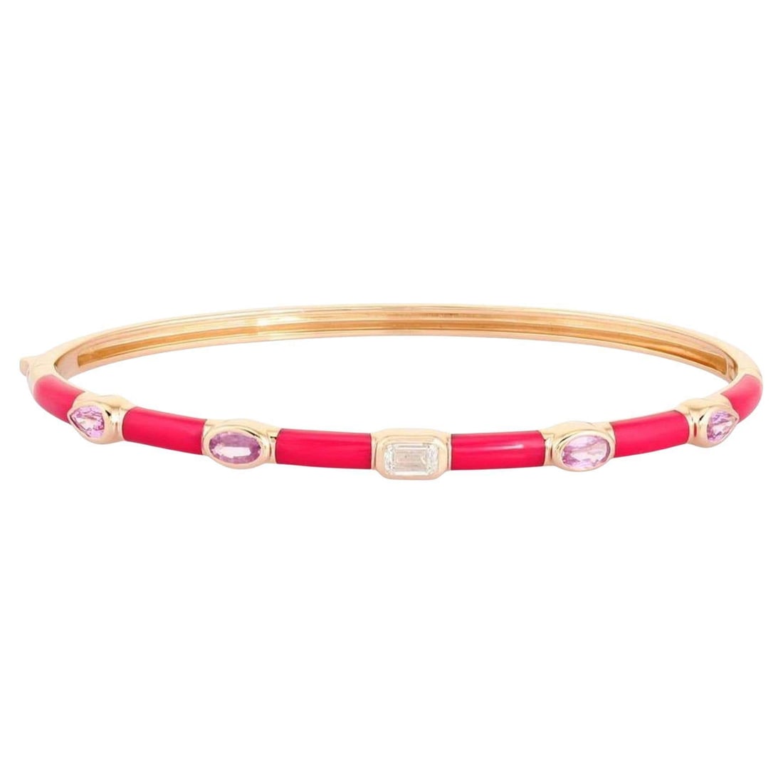 Harmony Bangle 14K (or 18k upon request) Yellow Gold Diamond Bracelet: The Harmony Bangle 14K Yellow Gold Diamond Bracelet combines 0.31 carats of natural fancy diamonds with 0.85 carats of vibrant pink sapphires, set in luxurious 14K yellow gold. Weighing 8.80 grams, th