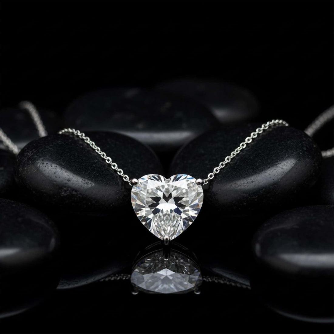 Heart-Cut 14K (or 18k upon request) White Gold Pendant Diamond Necklace: Celebrate timeless elegance with this stunning 1.75-carat heart-cut diamond pendant, beautifully suspended on a fine white gold chain. The expertly crafted heart-shaped brilliant cut captures light fr