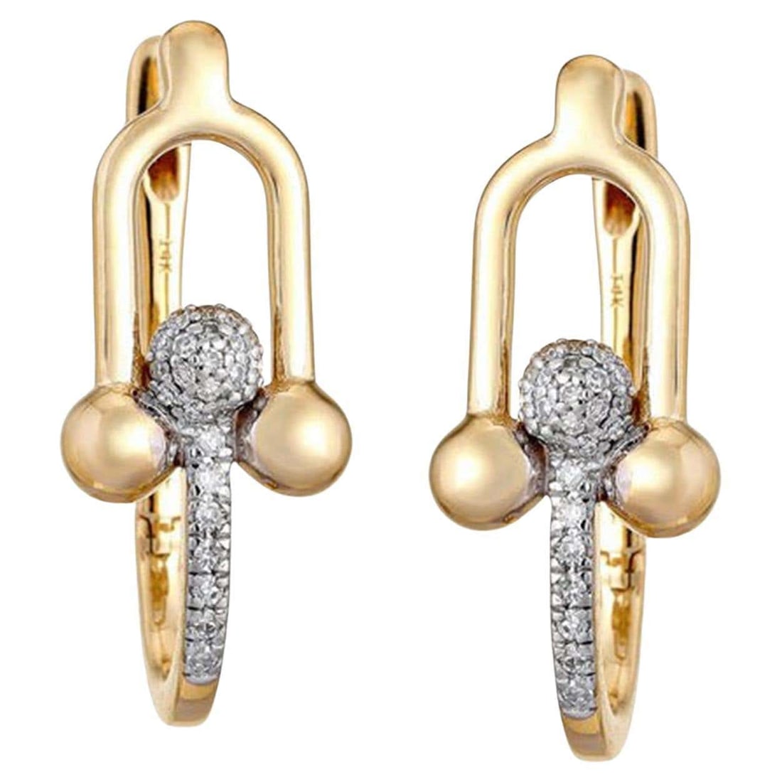 Sapphire Shine 14K (18K Custom) Yellow Gold Diamond Huggie Earrings: The Sapphire Shine 14K Yellow Gold Diamond Huggie Earrings are a striking blend of luxury and elegance. Crafted from 14K gold, these huggie earrings feature rich blue sapphires, accentuated by