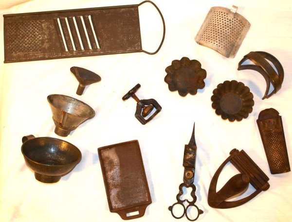 Kitchen utensils: Assorted kitchen utensils including graters/ funnels/ cookie cutter/ candlewick clippers. 13 pieces.