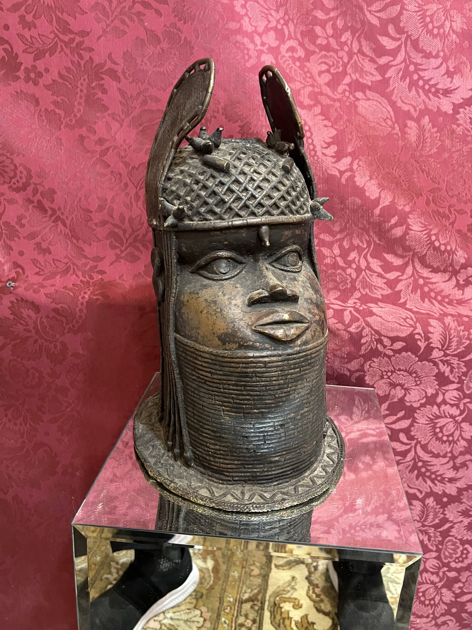 Antique Benin Style Bronze Oba Head | West African Commemorative Sculpture | 12" Antique Finish: This impressive bronze sculpture is a commemorative head representing an Oba (King) or a high-ranking member of the royal court from the historic Benin Kingdom (modern-day Nigeria). These heads were t