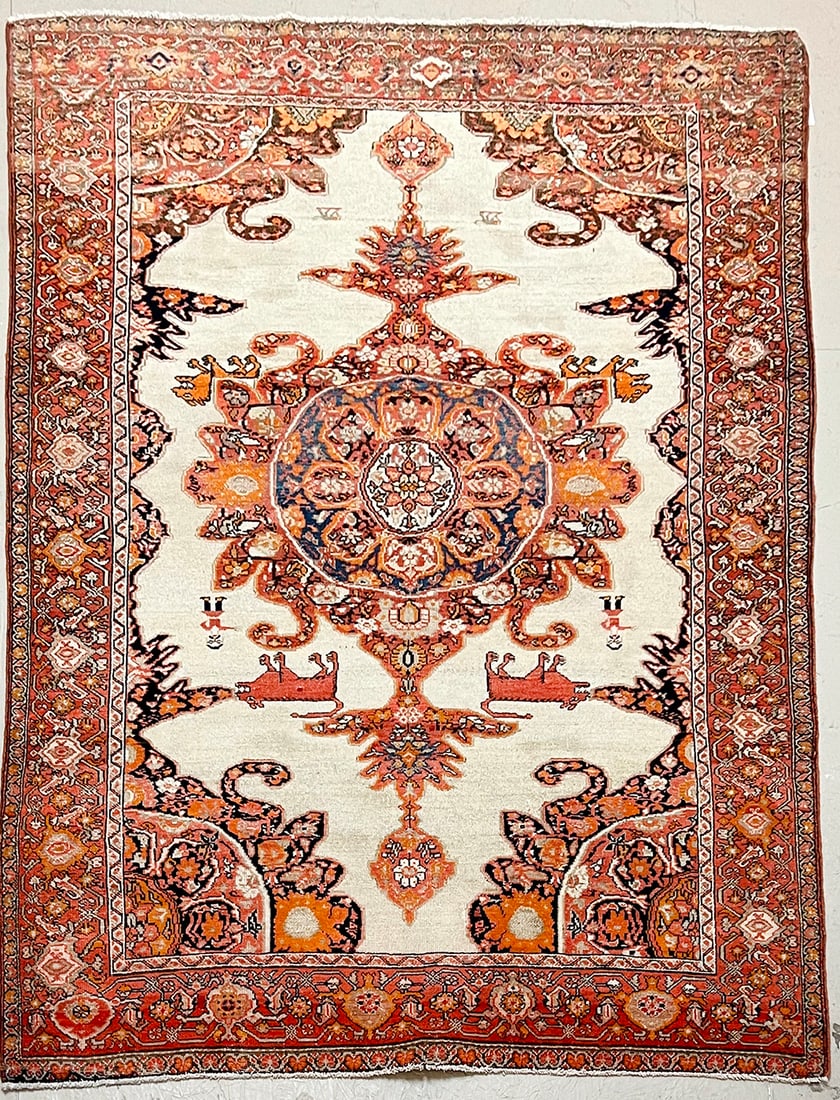 Rare Antique Sarouk Farahan Rug, A Treasure from Persia, 4'7" x 6'7": This visually striking antique rug showcases the hallmarks of a classic Sarouk Farahan design, a treasured style from Persia. Measuring approximately 4'7" x 6'7", this piece features a characteristic 