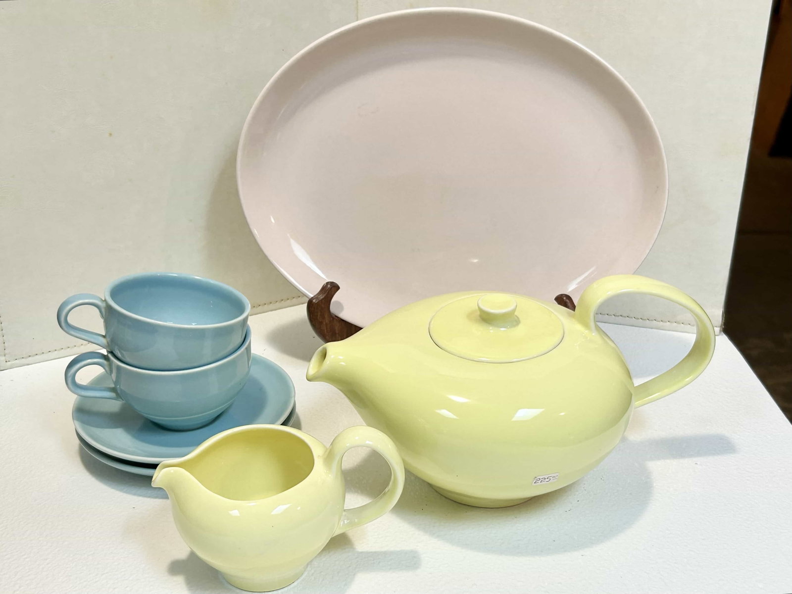 Russel Wright 7pc Iroquois Teapot, Creamer, Tea Cups & Saucers, Pastel Colors: Russel Wright Iroquois set of 7 pieces in pastel colors. Pink platter measures 12.5" wide. Also comes with teapot, creamer, 2 cups and 2 saucers. All in good condition.