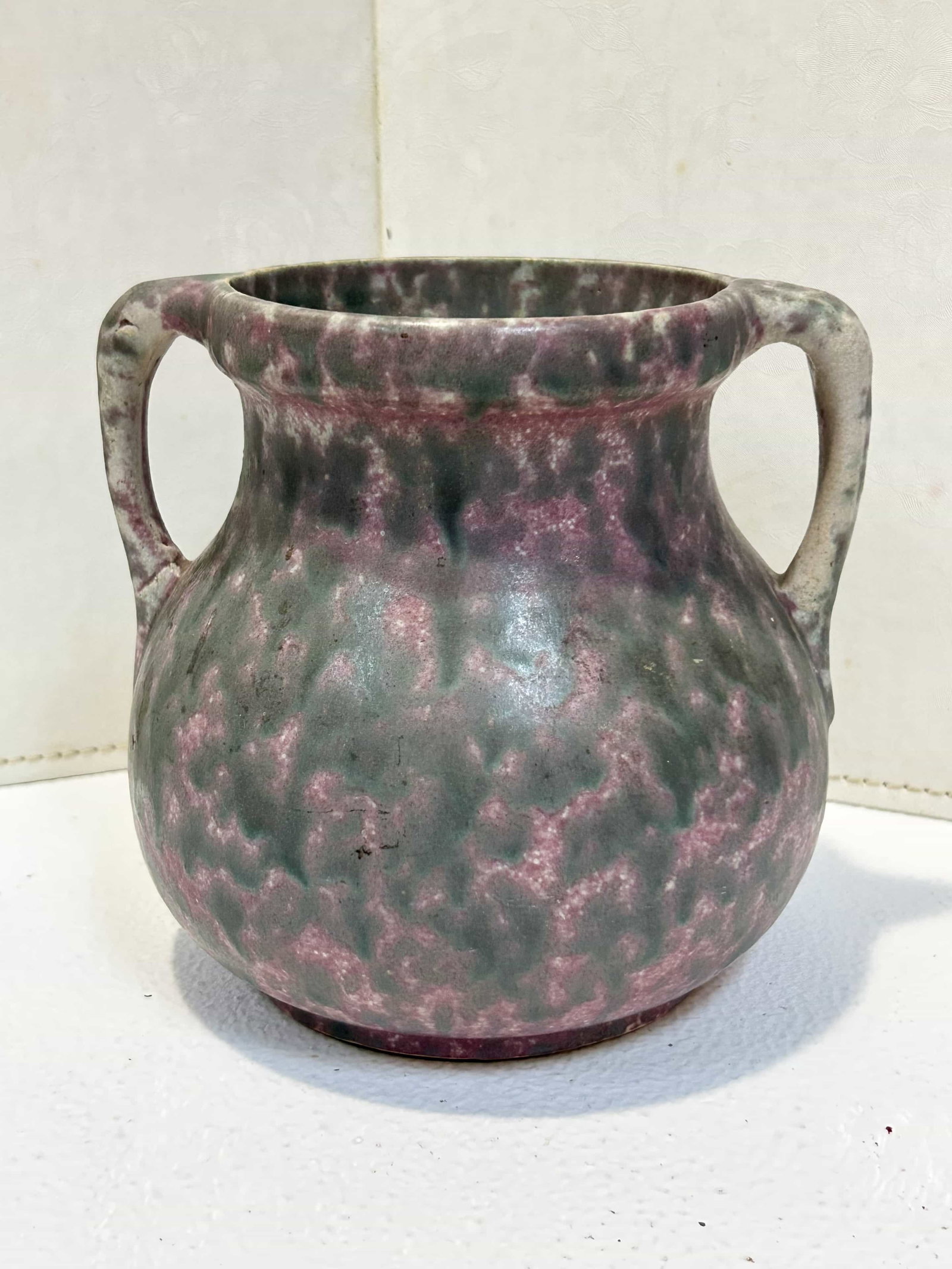 Antique Burley Winter Art Pottery Vase / Planter: Beautiful antique Burley Winter planter vase in a mottled purple & green glaze, early 20th Century. Good condition w/ no visible cracks or chips. Measures approx. 10" tall. "54" is marked on bottom.