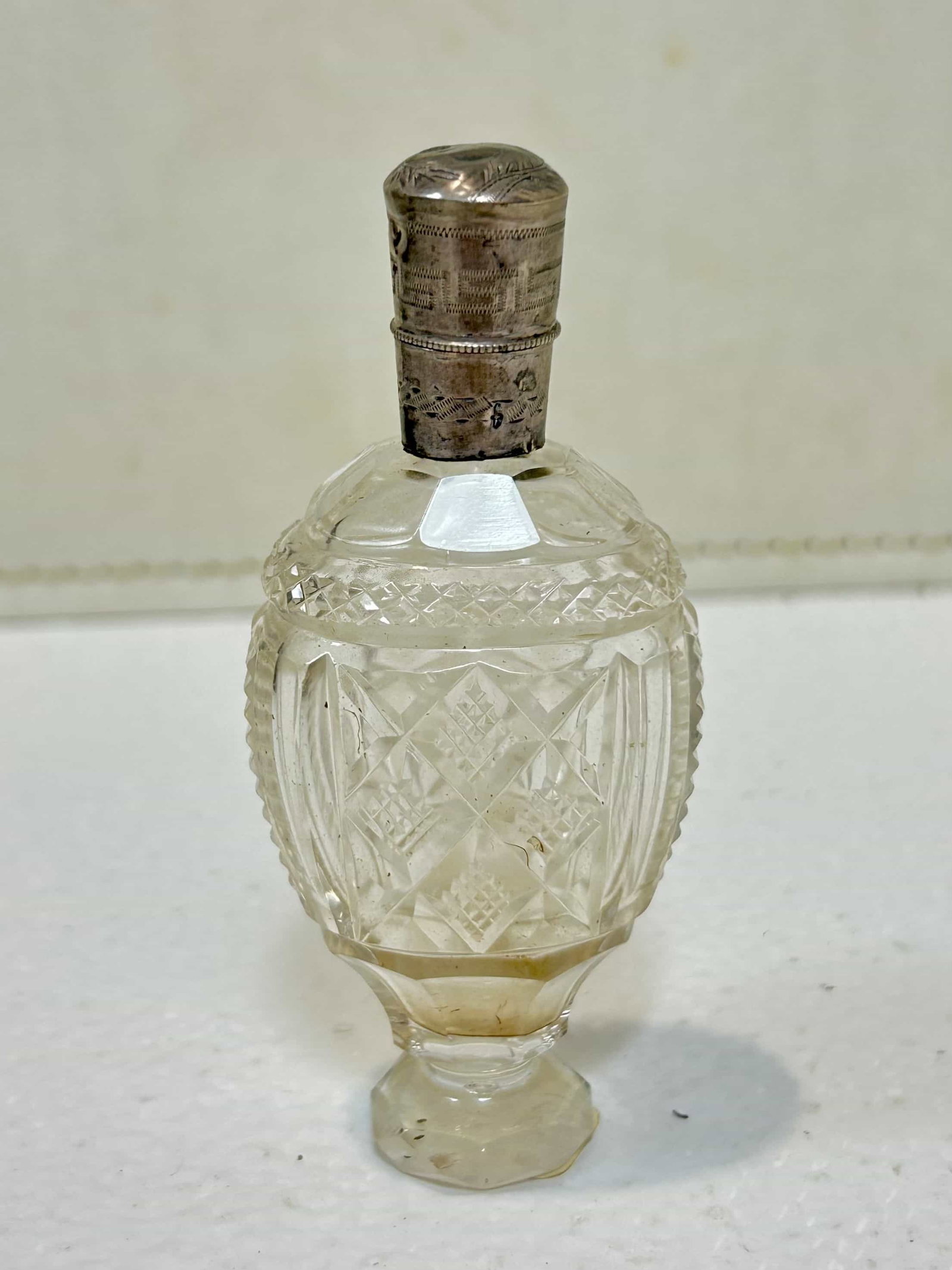 Cut Crystal Perfume Bottle w/ Silver Cap, Glass Applicator: Unsure if cap is sterling or plated?no visible marks that I can see. Measures 3.75" tall. Good condition with no visible chips or cracks.