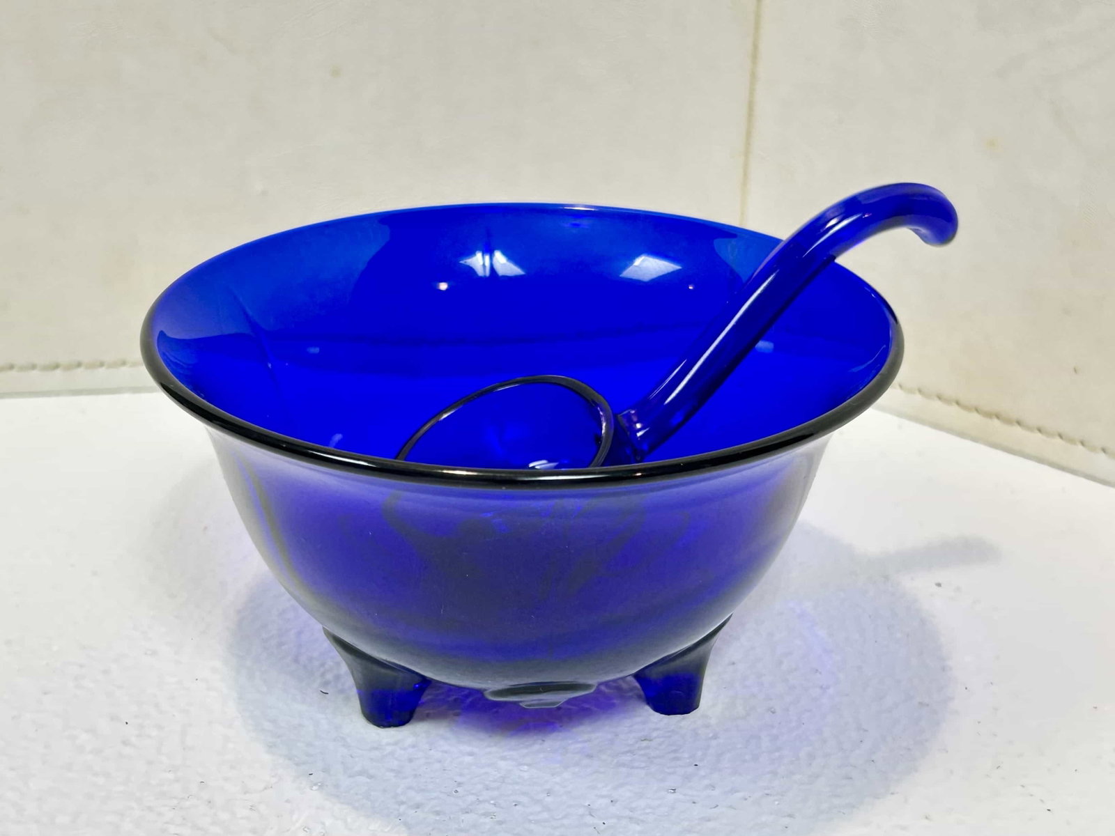 New Martinsville Glass, Cobalt Blue Moon Drops Mayonaisse Bowl w/ Ladle: Beautiful cobalt blue mayonaisse dish with ladle made by the New Martinsville Glass Co. Moondrops pattern. Measures 5.5" diameter, 3" tall. The feet have small chips (see photos), glass shows no crack