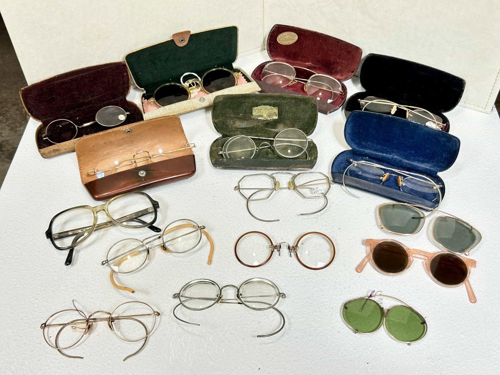 Large Vintage Lot of Eye Glasses, Sun Glasses, Cases: This lot includes 16 various pairs of vintage eye glasses and sun glasses w/ seven cases. Most are in great vintage/used condition. See photos for variations and types of glasses.