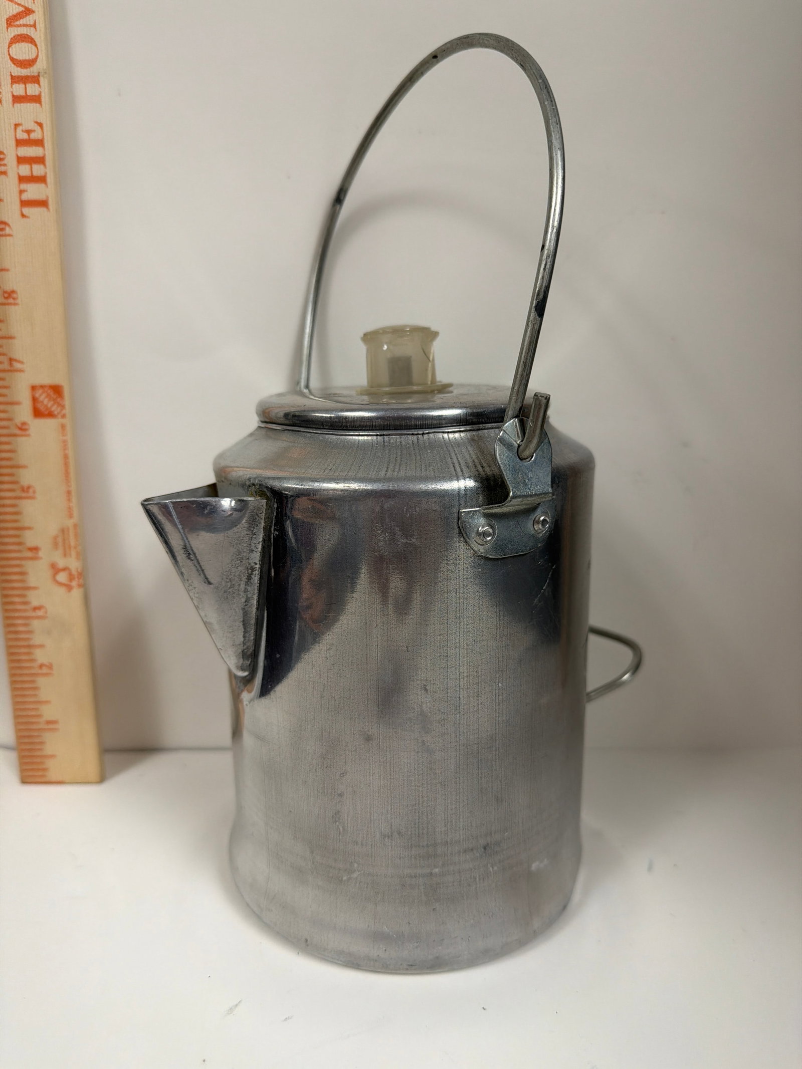 Vintage aluminum coffee (chipped) percolator: This is a vintage 9-cup aluminum coffee percolator commonly used for camping.It features a durable, rustproof polished aluminum body with both a bail handle for hanging and a side handle for