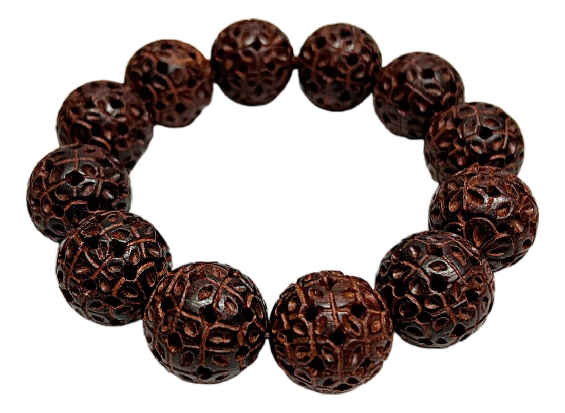 Chinese Zitan Rosewood Carved Beads Hand Rosary Praying Bracelet: Discover a truly unique and meaningful accessory with this Hand-Carved Chinese Zitan Rosewood Bracelet. Beyond its striking aesthetic, the "flower star" motif on each bead symbolizes growth,