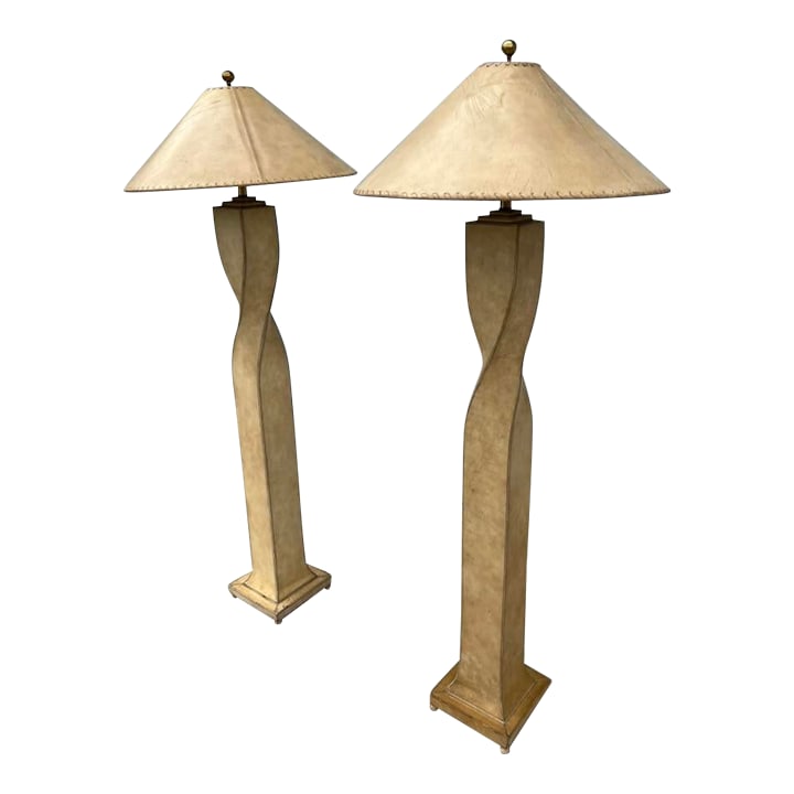 Pair of 1990s Lexington Furniture Cream Leather Floor Lamps With Matching Leather Shades: A stunning pair of cream leather–wrapped floor lamps handcrafted for Lexington Furniture Industries in 1996, produced by the same factories known for Maitland Smith lighting and décor. Thes