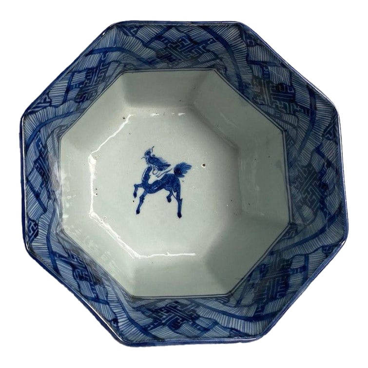 Chinese Blue & White Octagonal Porcelain Bowl With Qilin – Textile Pattern – 7" –: A striking Chinese blue and white octagonal porcelain bowl featuring a central qilin rendered in expressive underglaze cobalt. The interior is finished in a soft celadon-toned glaze with a single,