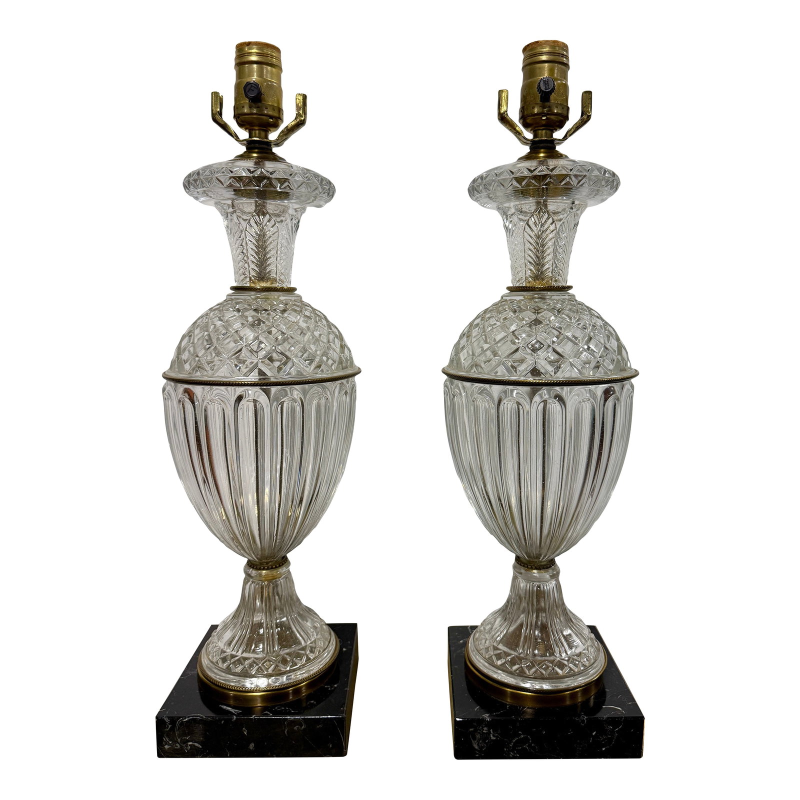 Pair, Paul Hanson Cut Crystal, Ormolu & Marble Table Lamps, Mid-20th Century: A matched pair of Paul Hanson table lamps in the Neoclassical taste, each composed around an urn-form cut-crystal reservoir that rises from a stepped black marble base and is crowned by a brass socket