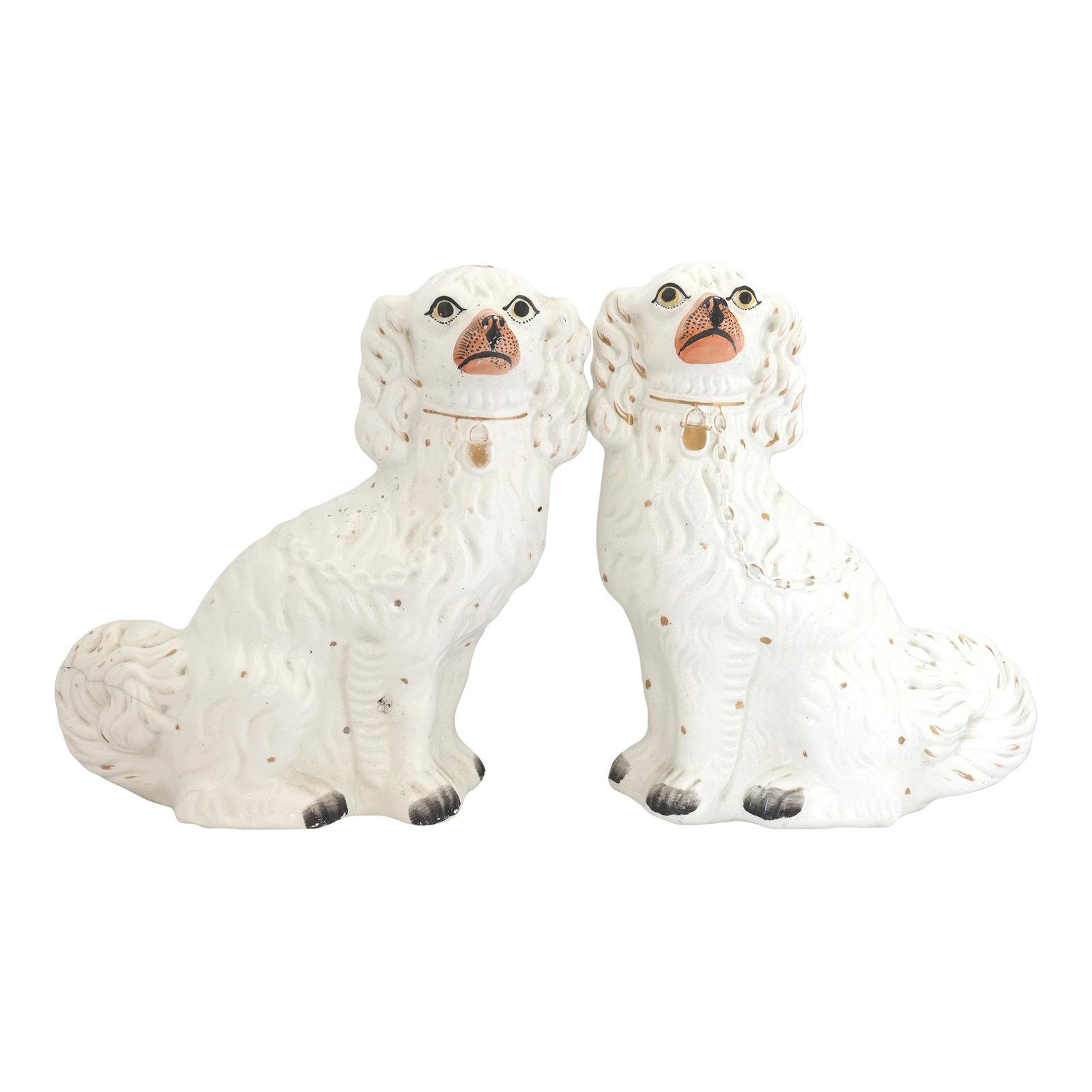 Large Antique Staffordshire Dogs: Large antique English Staffordshire King Charles spaniel dogs featuring a traditional seated form with hand-painted decoration and characteristic pink noses. Large examples such as these were