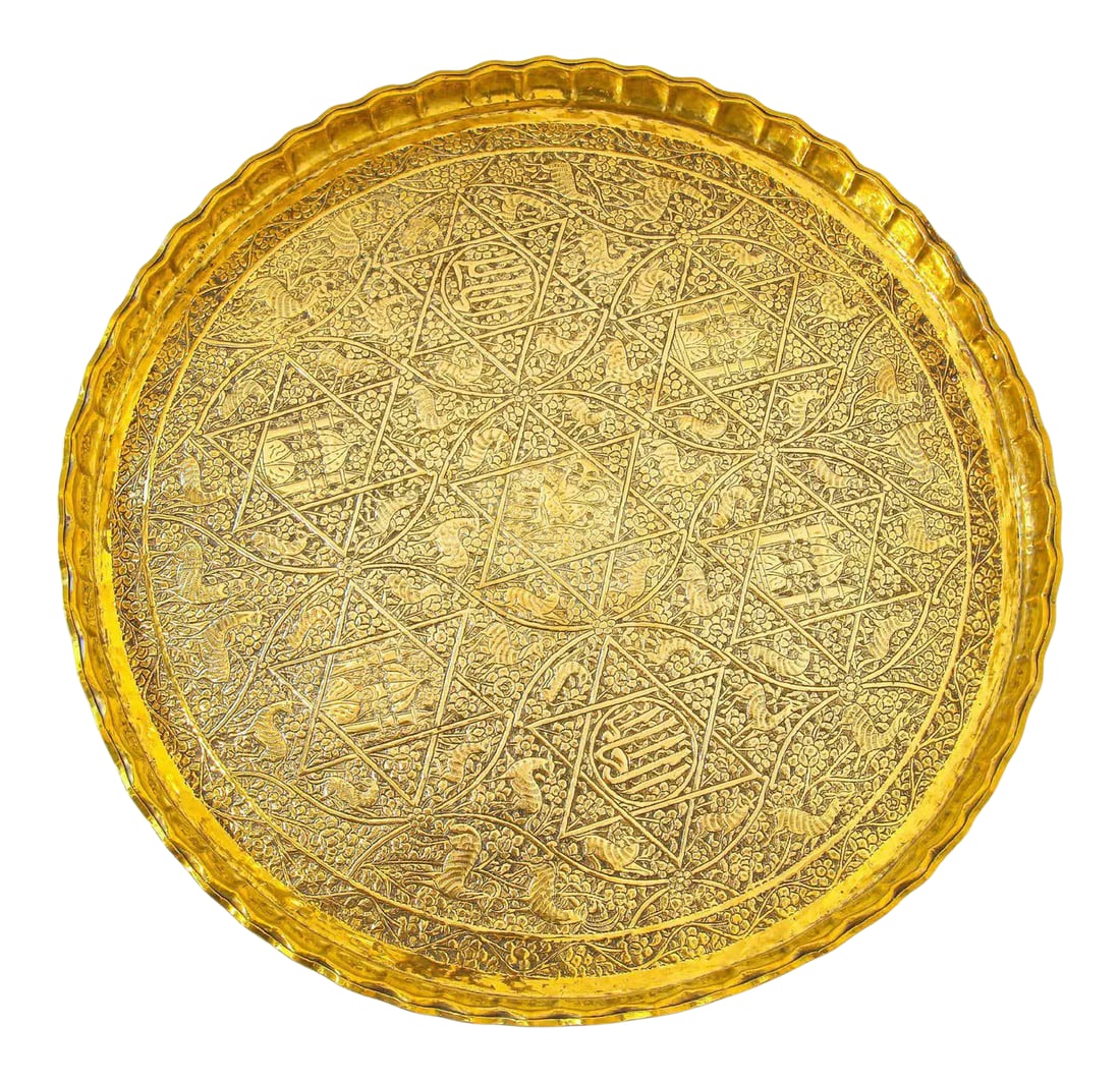 Indo-Persian Mughal Handcrafted Hammered Brass Decorative Tray: Large handcrafted decorative Indo-Persian Mughal brass tray. Asian metalwork finely embossed and hammered with floral and figural and animals mystique scenes and Arabic calligraphy repousse writing in