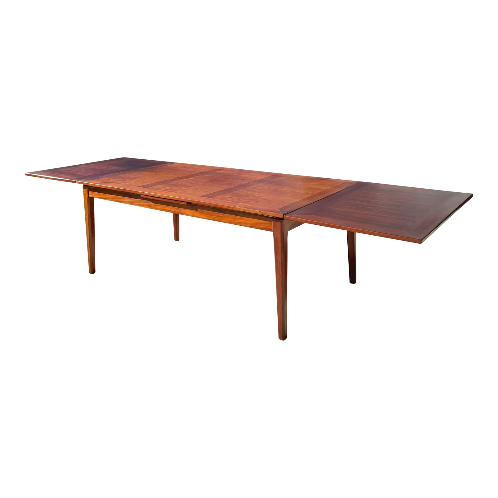 Mid Century Two-Toned Rosewood Extendable Dining Table for a Feast | by Skovby: Mid Century Extendable Dining Table by Skovby. A beautiful piece with stunning veneer work. This table has been lightly restored, with original patina left on apron and legs. Tabletop has been fully