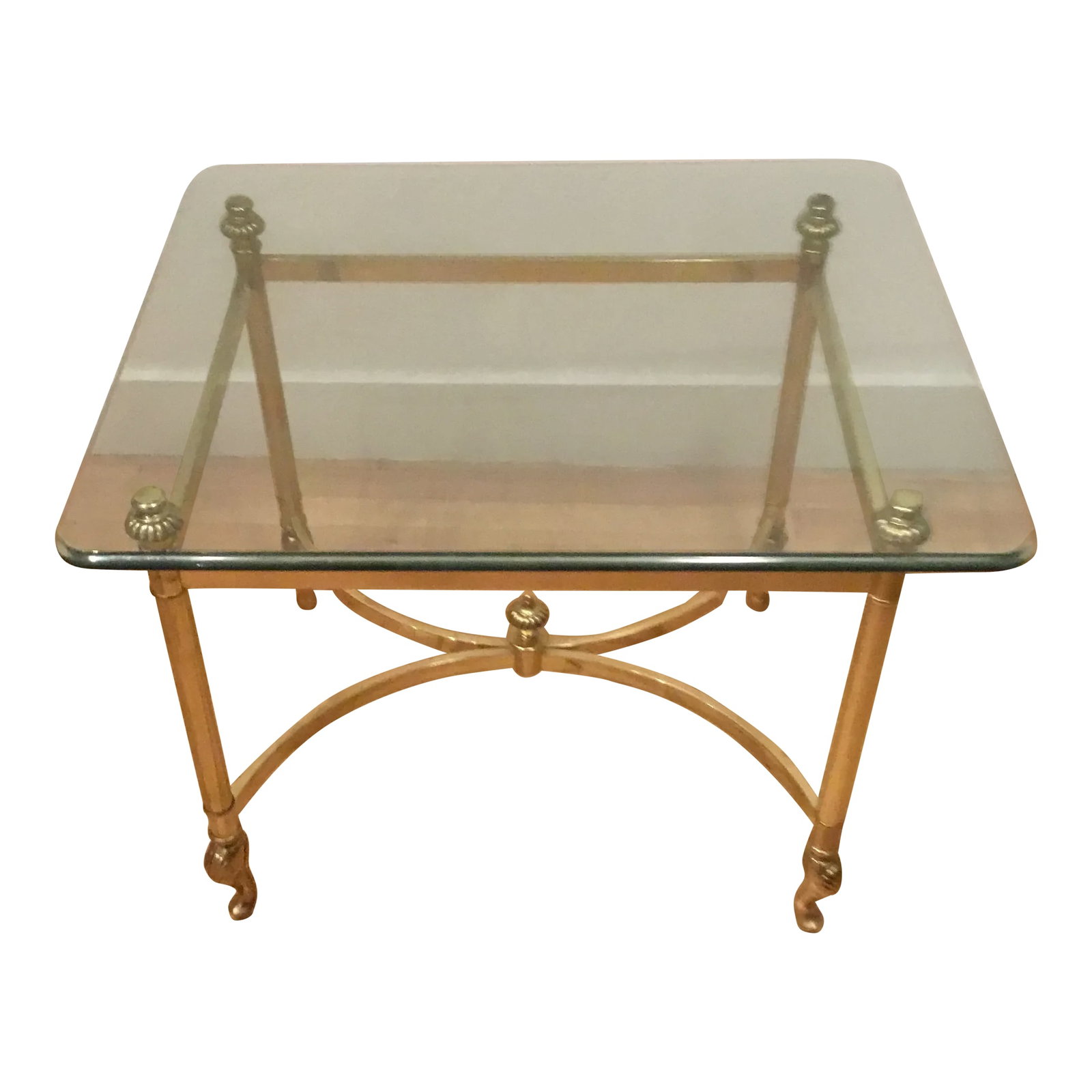 1980s Vintage Ethan Allen Hollywood Regency Type Coffee Table: Intake Ethan Allen Hollywood regency style coffee table. Features 1/2" thick glass top with Roman ogee edge and beautiful rounded corners. Imcredible brass features throughout, including art deco