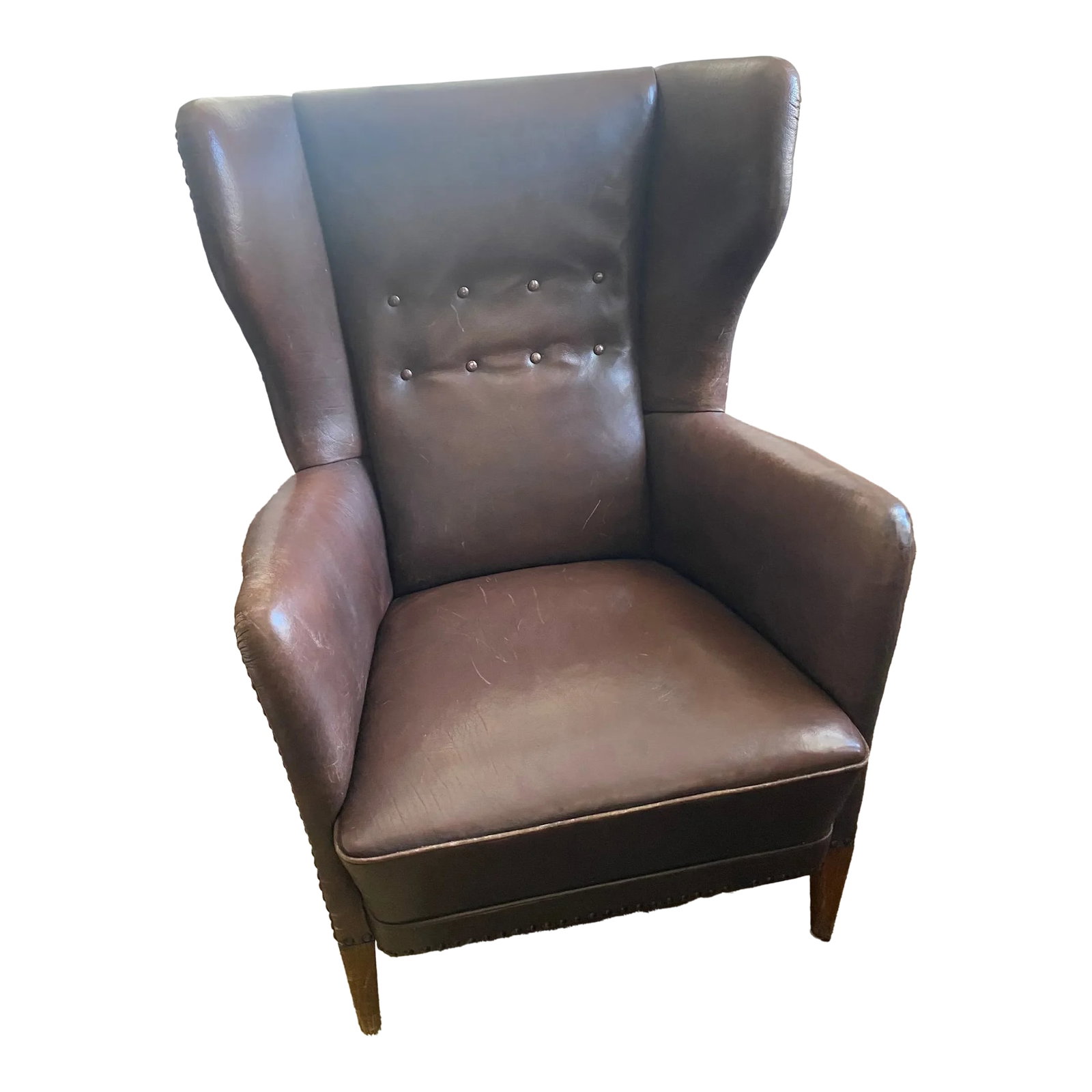 Circa 1950 Vintage Brown Leather High Back Chair, Denmark: Purchased at Nickey Kehoe in Los Angeles April 2023. Vintage Danish Leather Chair C1950. Good condition with some marks due to age and original leather. Condition: Alterations: Original Condition