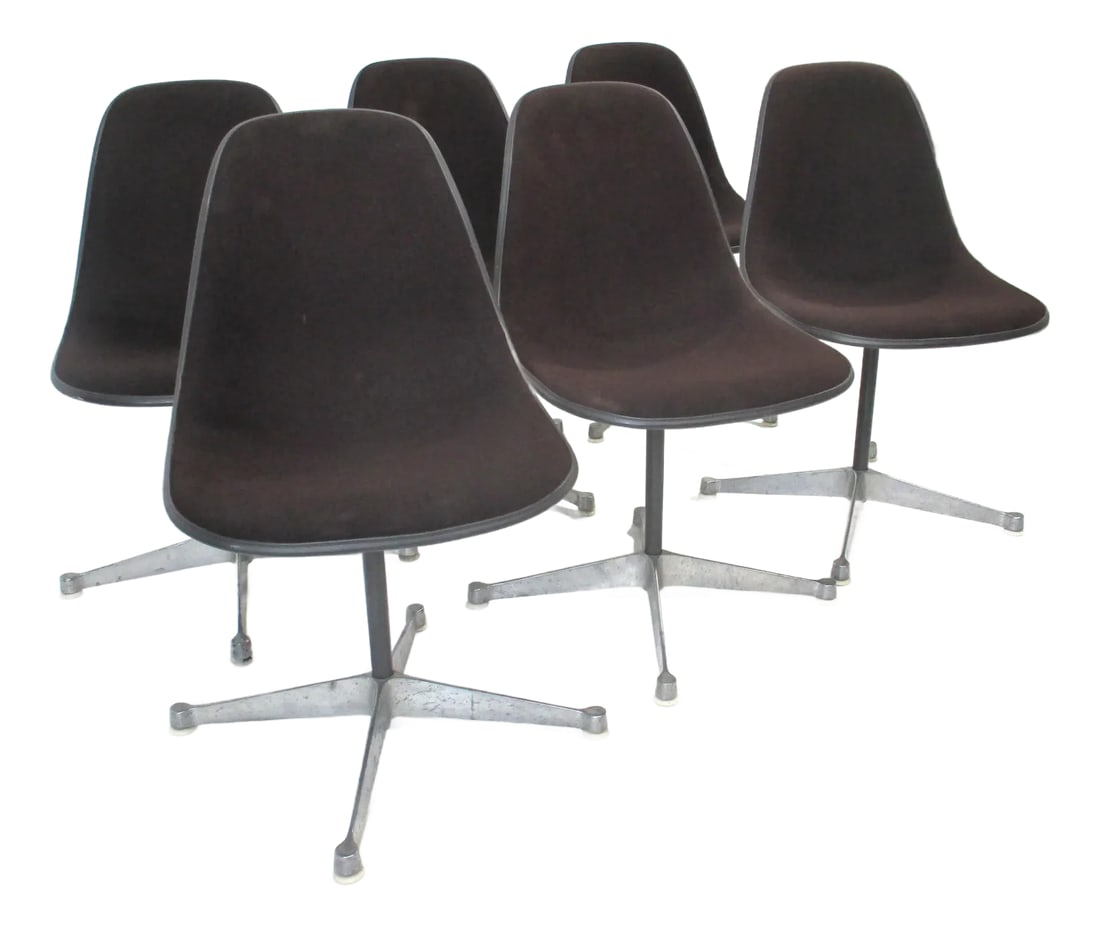 6 Eames Aluminum Group Swiveling Dining Chairs for Herman Miller: A set of six swiveling Eames Aluminum Group dining chairs with cast four star bases having plastic foot pads to protect your floors . Upholstered in a dark chocolate brown tight woven fabric with gray