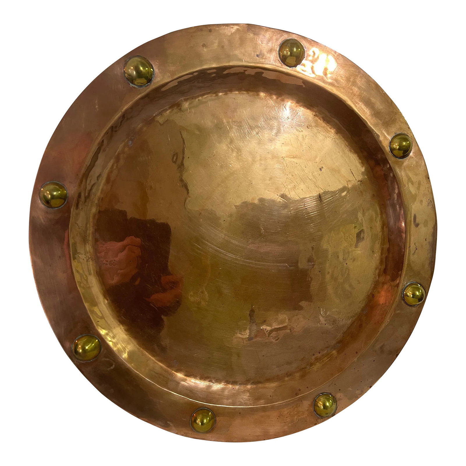 Mid 20th Century Hand Forged Copper Tray With Brass Buttons: This copper tray is presumed to be from Mexico, though there is no mark. It is heavy and solid with decorative brass buttons soldered on to the rim. The tray measures 15.75" to the edges, and the
