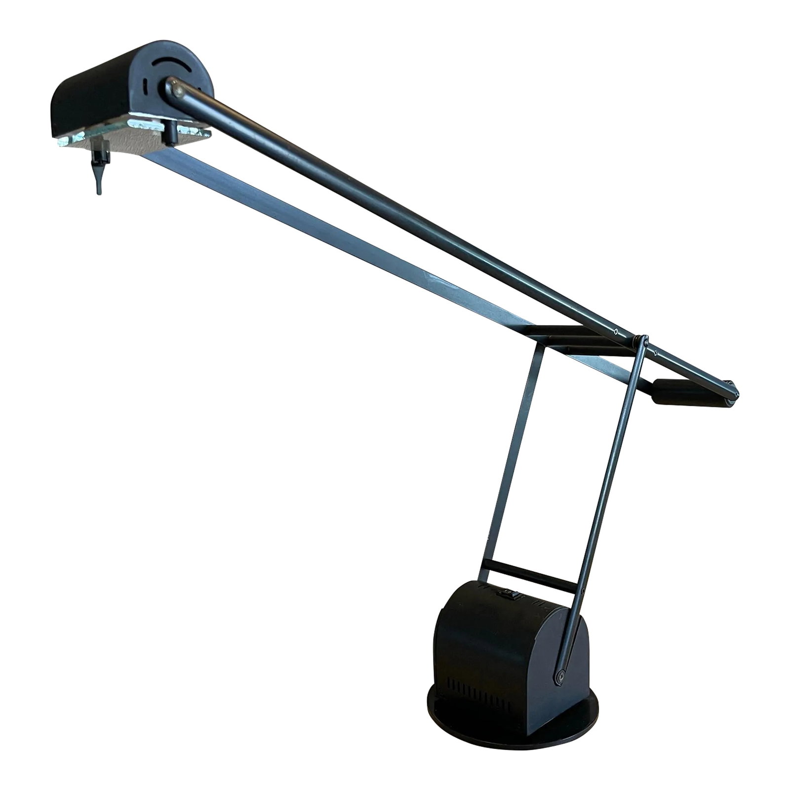 1980s Postmodern Black Cantilever Task Lamp by Lite Source Inc.: A sleek and sculptural articulating task lamp by Lite Source Inc., based in Chino, California. This 1980s design blends postmodern aesthetics with industrial functionality, making it a standout piece 