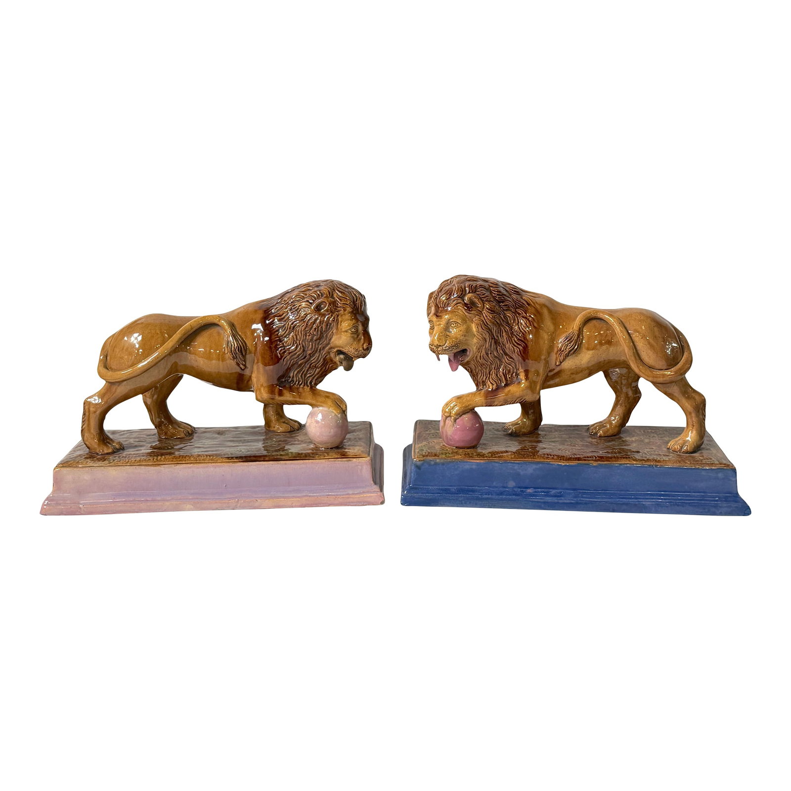 Rare Pair of Ralph Wood Staffordshire Medici Lions in Pink and Blue Bases: Rare Pair of Ralph Wood Staffordshire Medici Lions in Pink and Blue Bases, Attributed to Ralph Wood, Staffordshire, England, circa 1780 A rare and highly distinctive pair of Staffordshire Medici