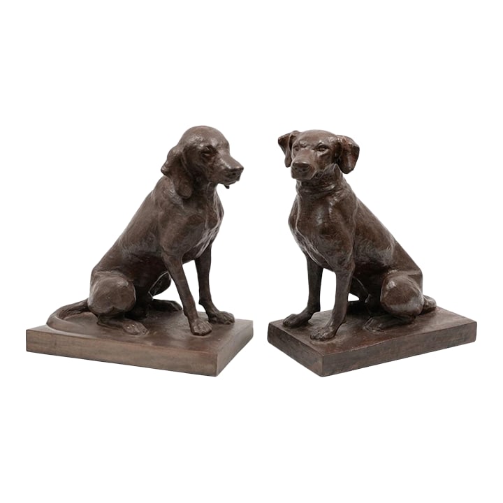Pair of Vintage Cast Iron Seated Hound Statues: This impressive pair of life-sized cast iron sculptures features two seated hounds, standing at an imposing height of 29 inches. Captured in a moment of alert repose, each dog is depicted with