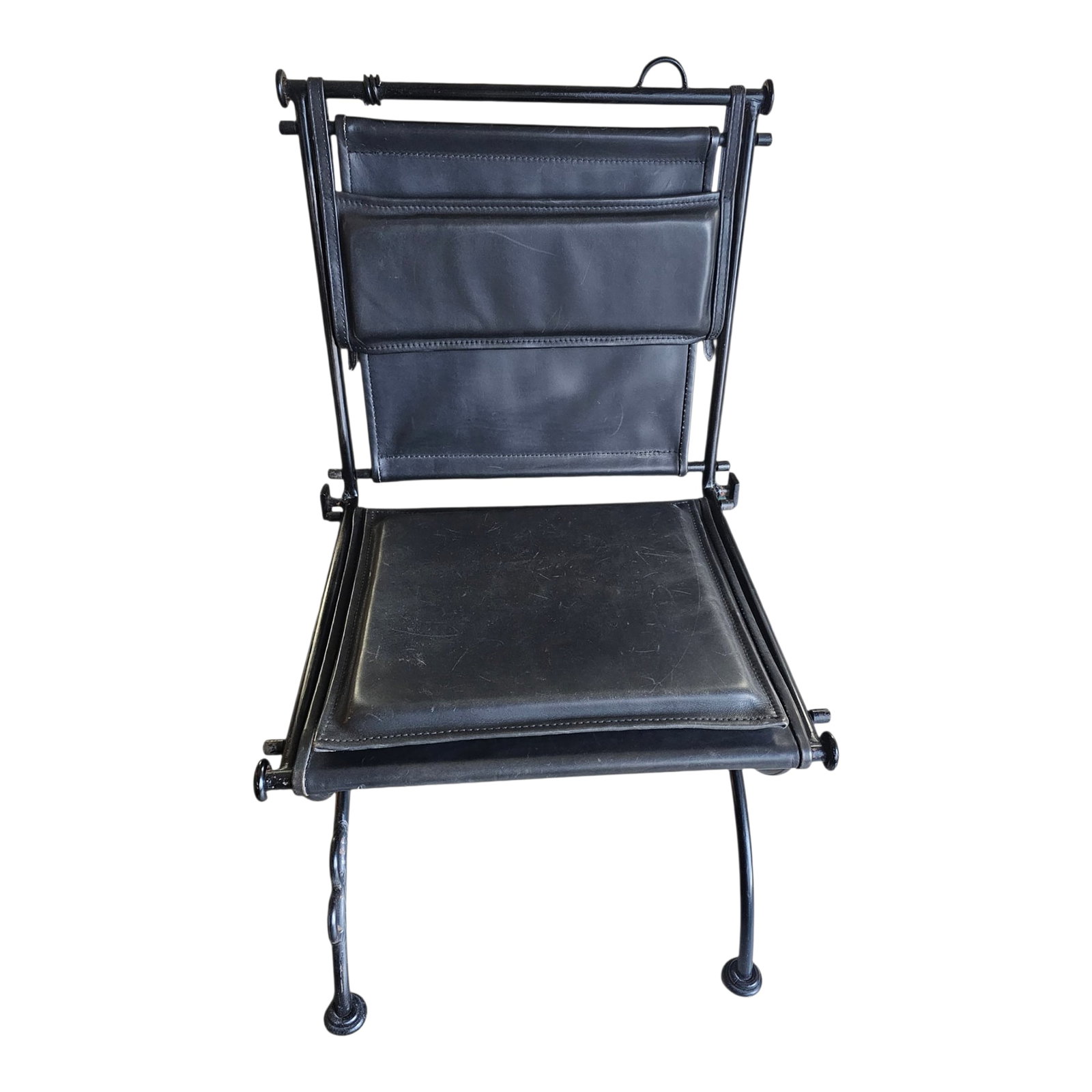 1960s Brutalist Style Sling Chair by Ilana Goor: Ilana Goor is known for brutalist style wrought iron and leather sling chairs with industrial aesthetics. Condition: Alterations: Original Condition Unaltered Imperfections: Some Imperfections