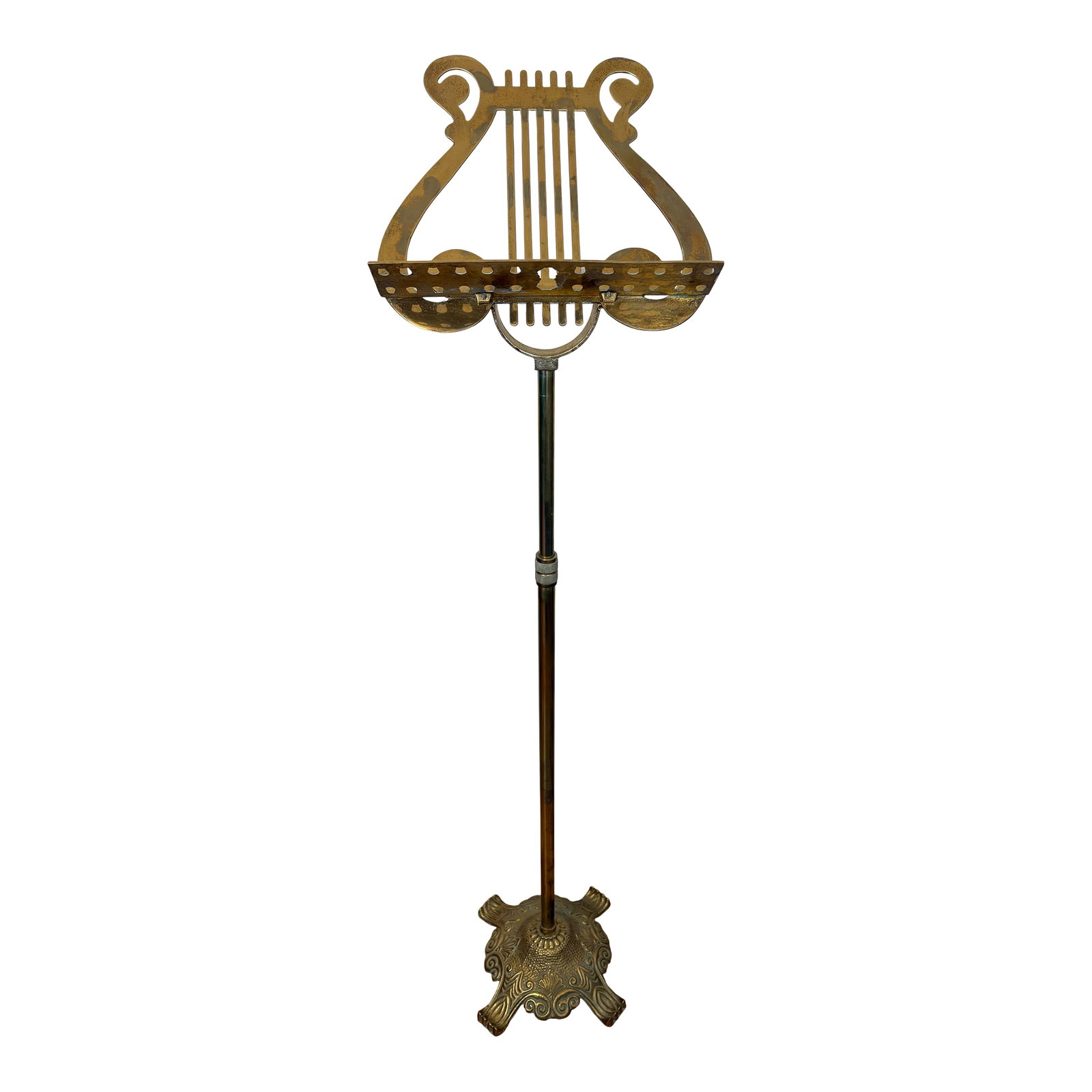 Vintage Brass Lyre Music Stand: This vintge brass lyre music stand is on an adjustable telescopic pole. These stands typically feature a lyre motif for the music tray as this one does. The footing has an ornamental footed base with